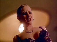 Anne Heche wearing an all black bra and bikini lingerie going to bed and arousing her partner. She sat on top of him while he kissed and nibbled on her panties making her squirm in ecstasy.